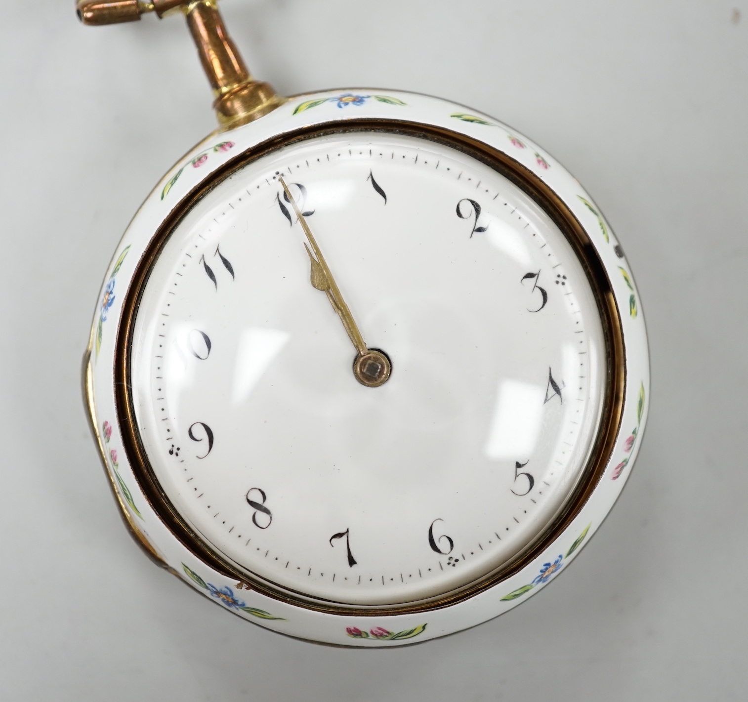 A 19th century gilt metal and polychrome enamel pair cased keywind verge pocket watch by Rigly, Roe & Newcomb of London, case diameter 52mm.